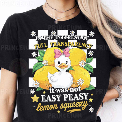 a woman wearing a black t - shirt with an image of a chicken on it