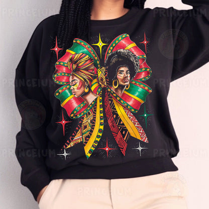 a woman wearing a black sweatshirt with a picture of two women on it