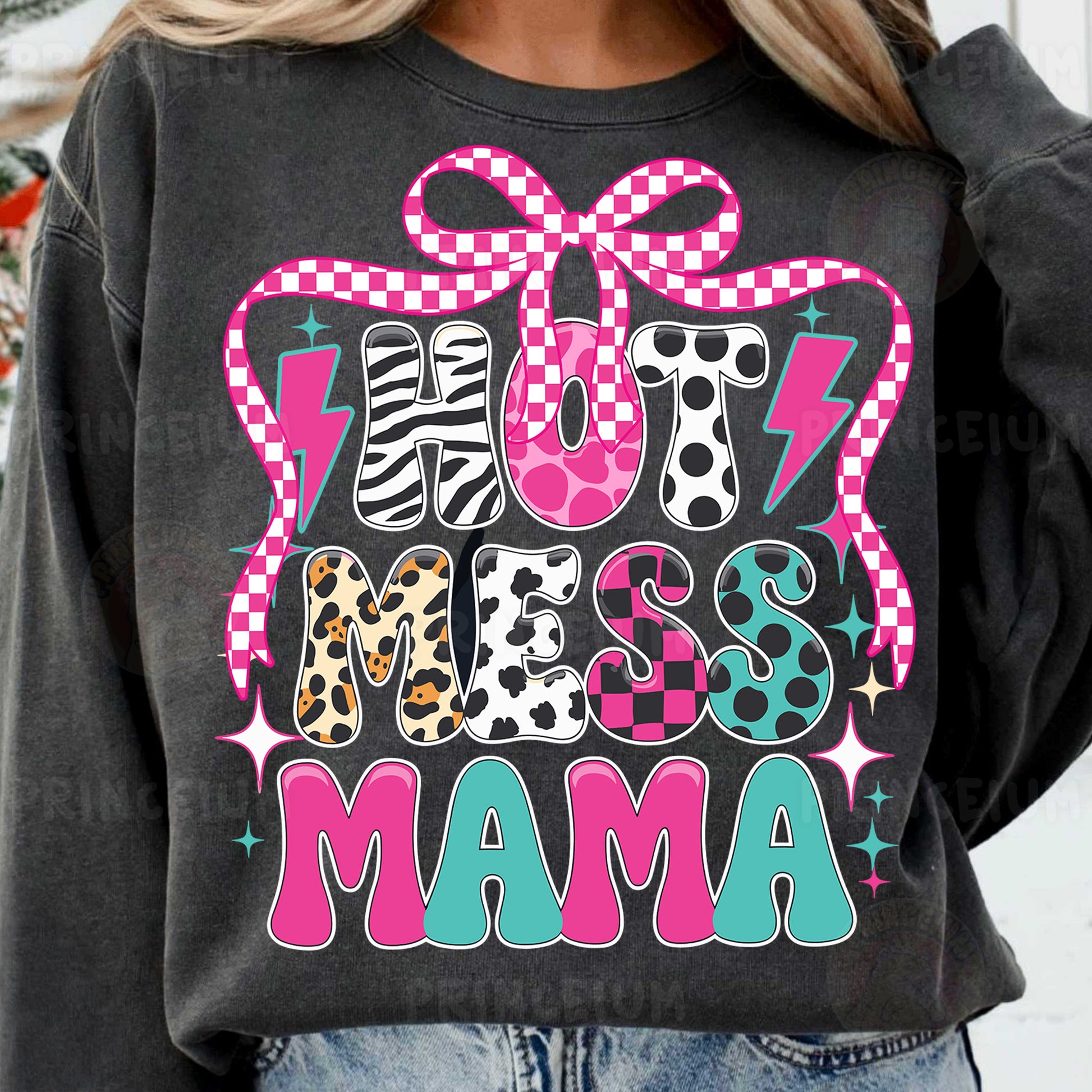 a woman wearing a black shirt with a pink bow on it