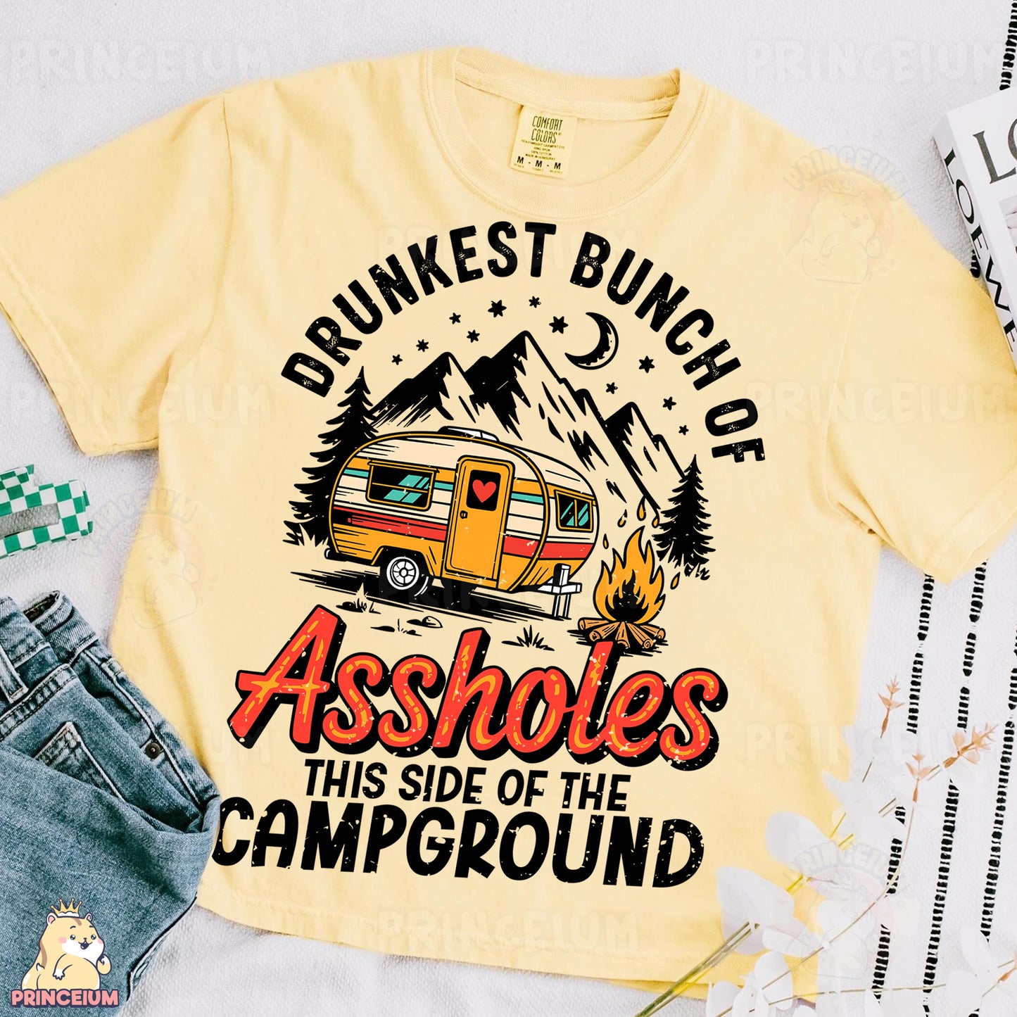 a yellow shirt with an image of a camper on it