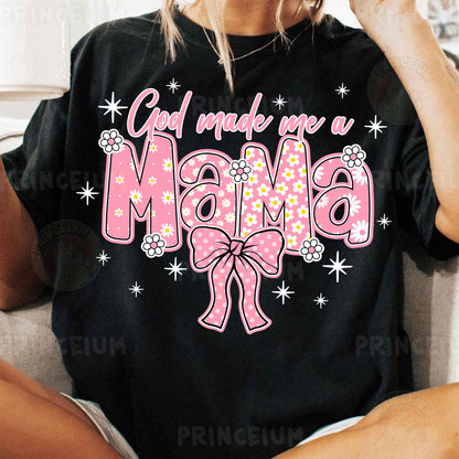 a woman sitting on a couch wearing a shirt that says god made me a mama