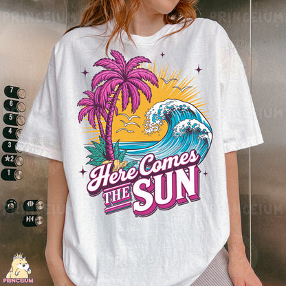 a woman wearing a t - shirt that says here comes the sun