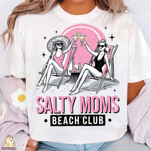 a woman wearing a t - shirt that says salty moms beach club