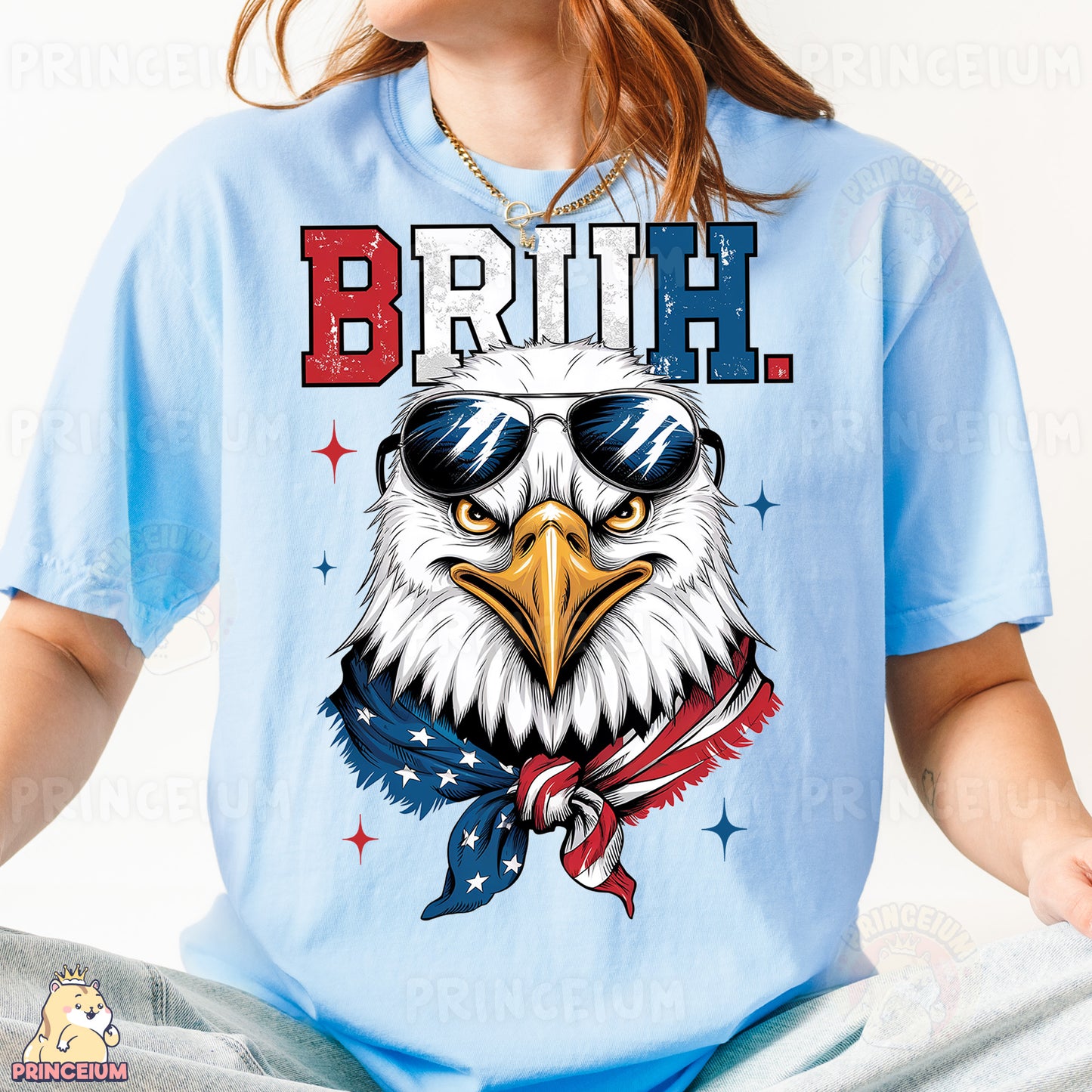 a woman wearing a blue shirt with an eagle wearing sunglasses