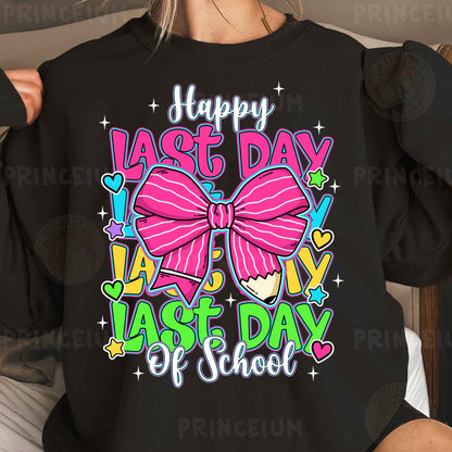 a woman wearing a black shirt with a pink bow on it