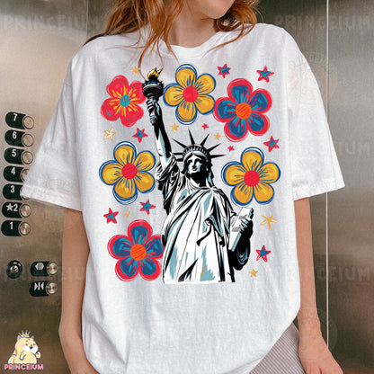 a woman wearing a t - shirt with the statue of liberty on it
