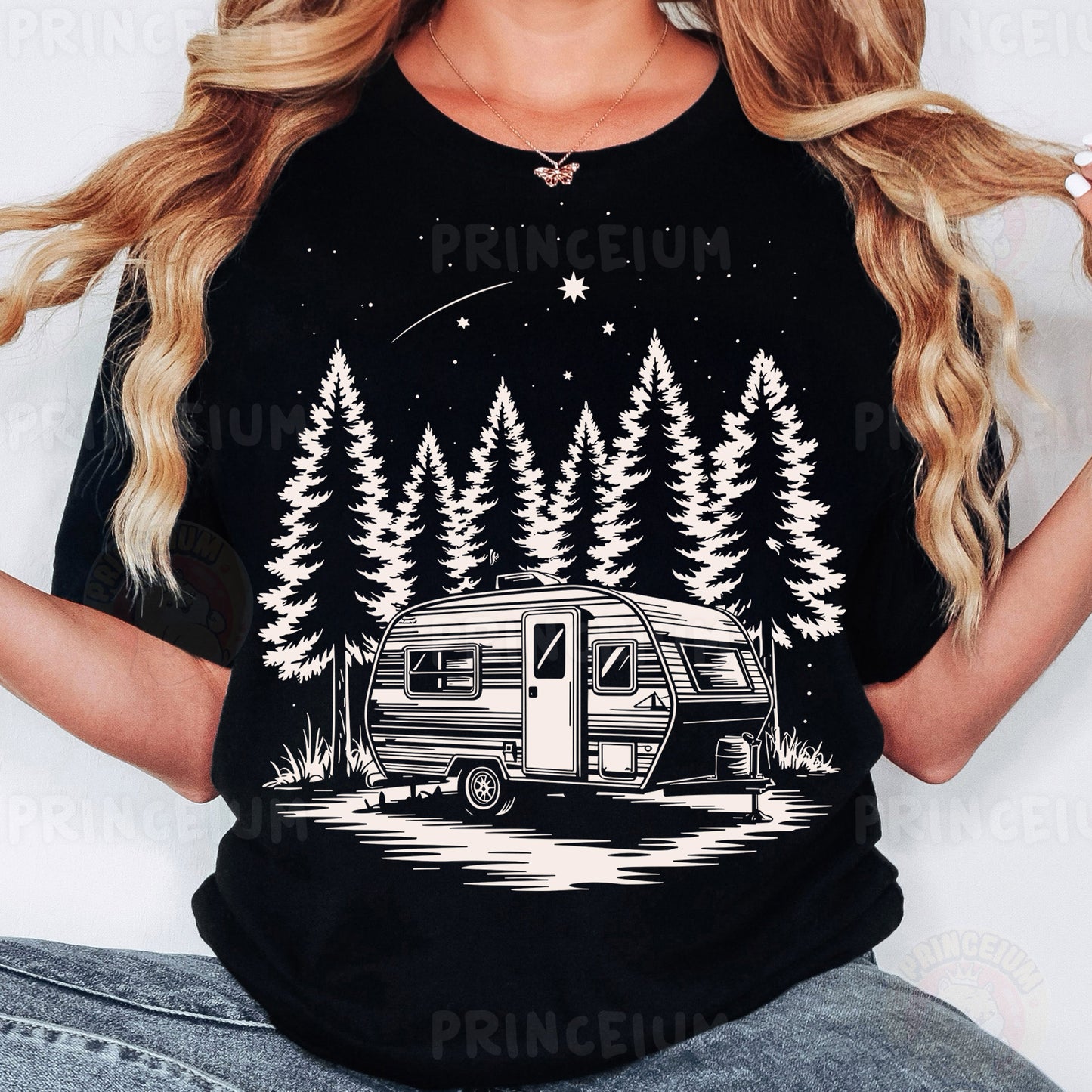 a woman wearing a black shirt with a camper on it