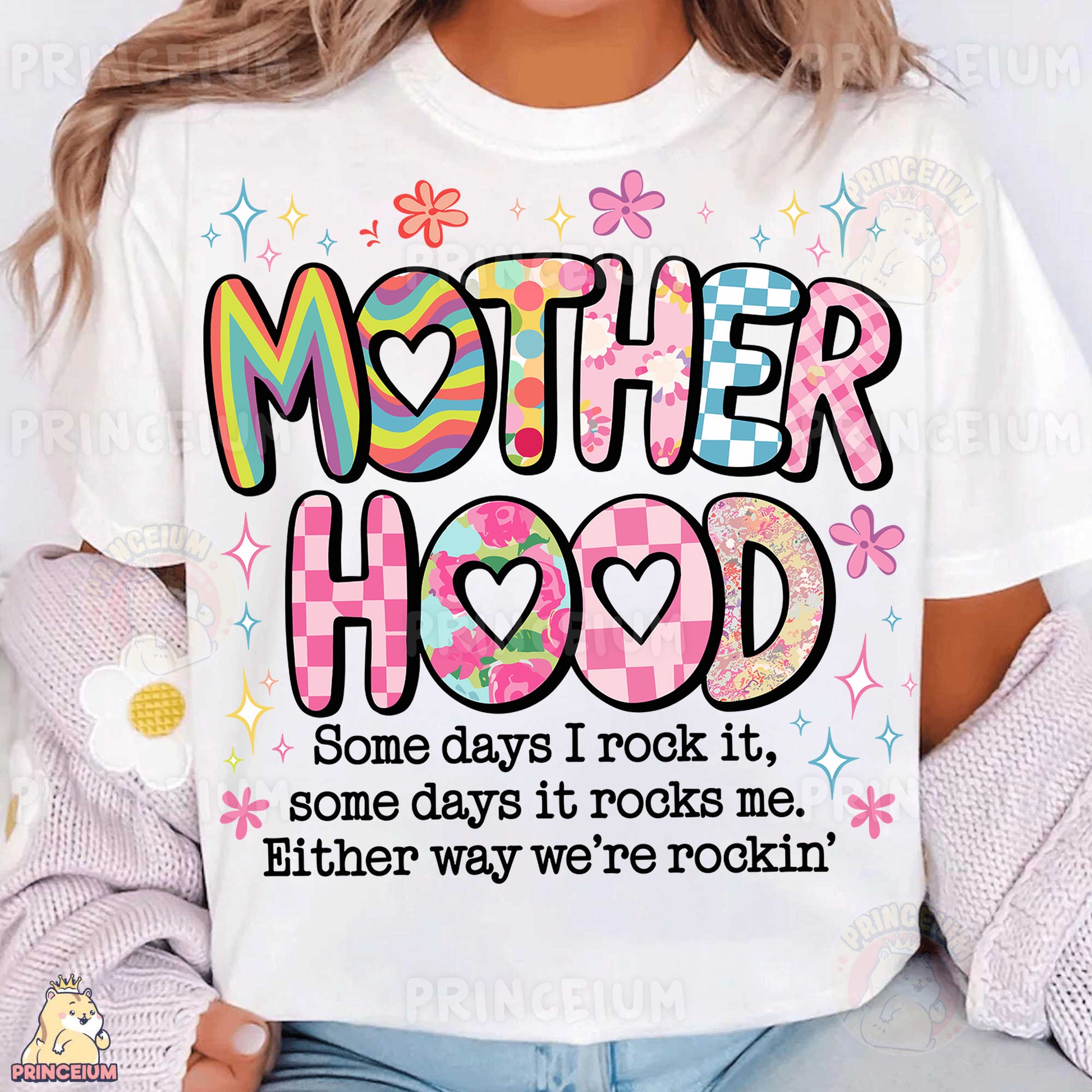 a woman wearing a t - shirt that says motherhood