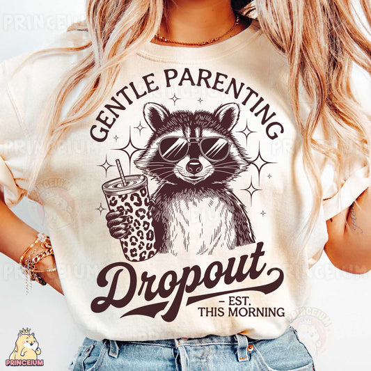 a woman wearing a t - shirt with a raccoon holding a drink