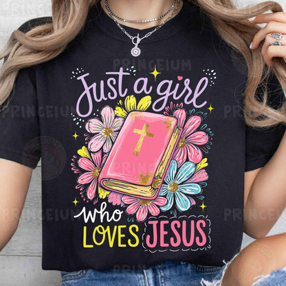 a woman wearing a t - shirt that says just a girl who loves jesus