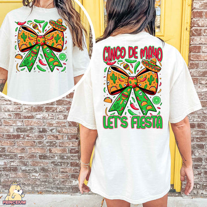a woman wearing a t - shirt with a bow on it