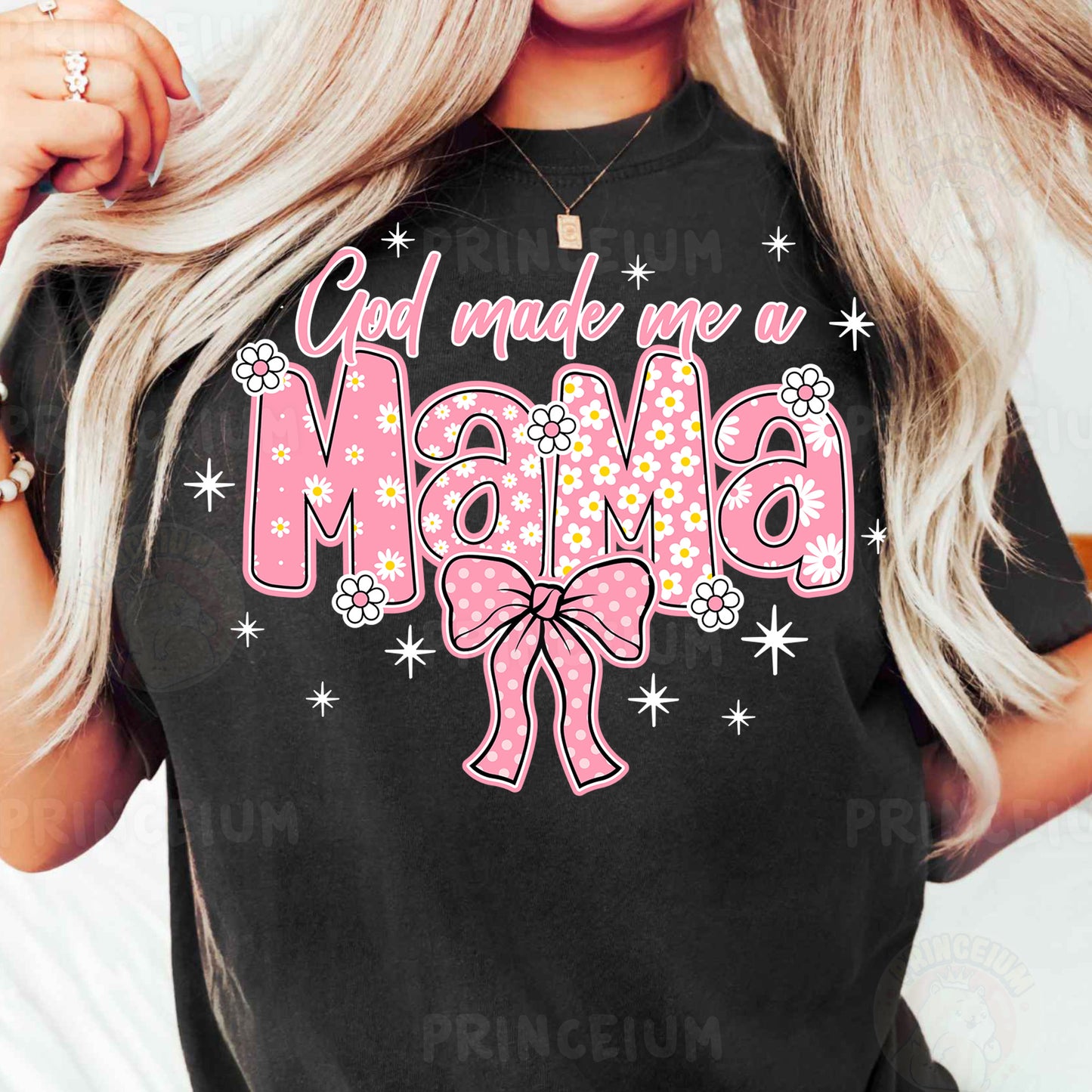 a woman wearing a black shirt with a pink bow