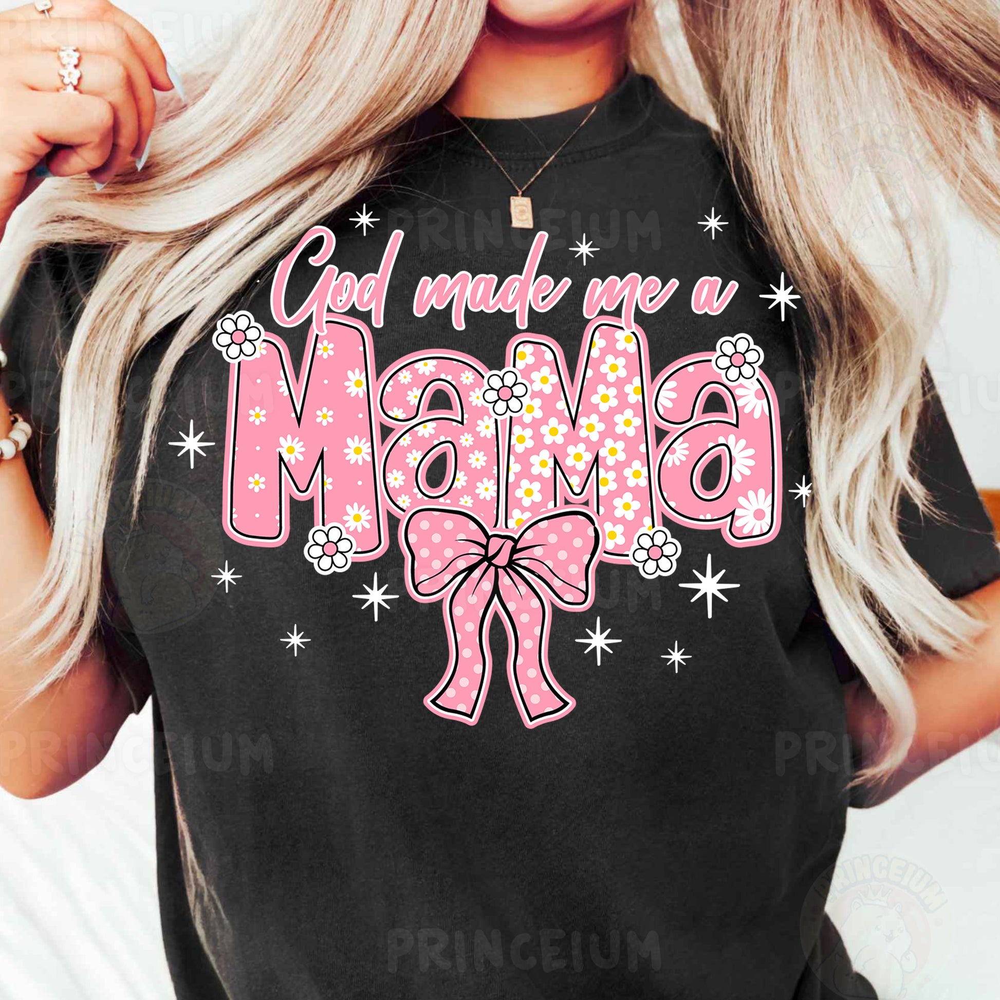 a woman wearing a black shirt with a pink bow