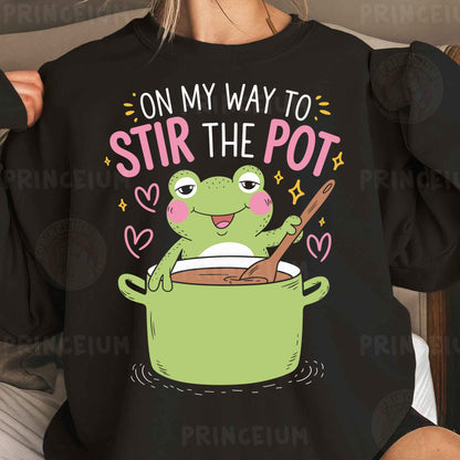 a woman wearing a t - shirt that says, on my way to stir the