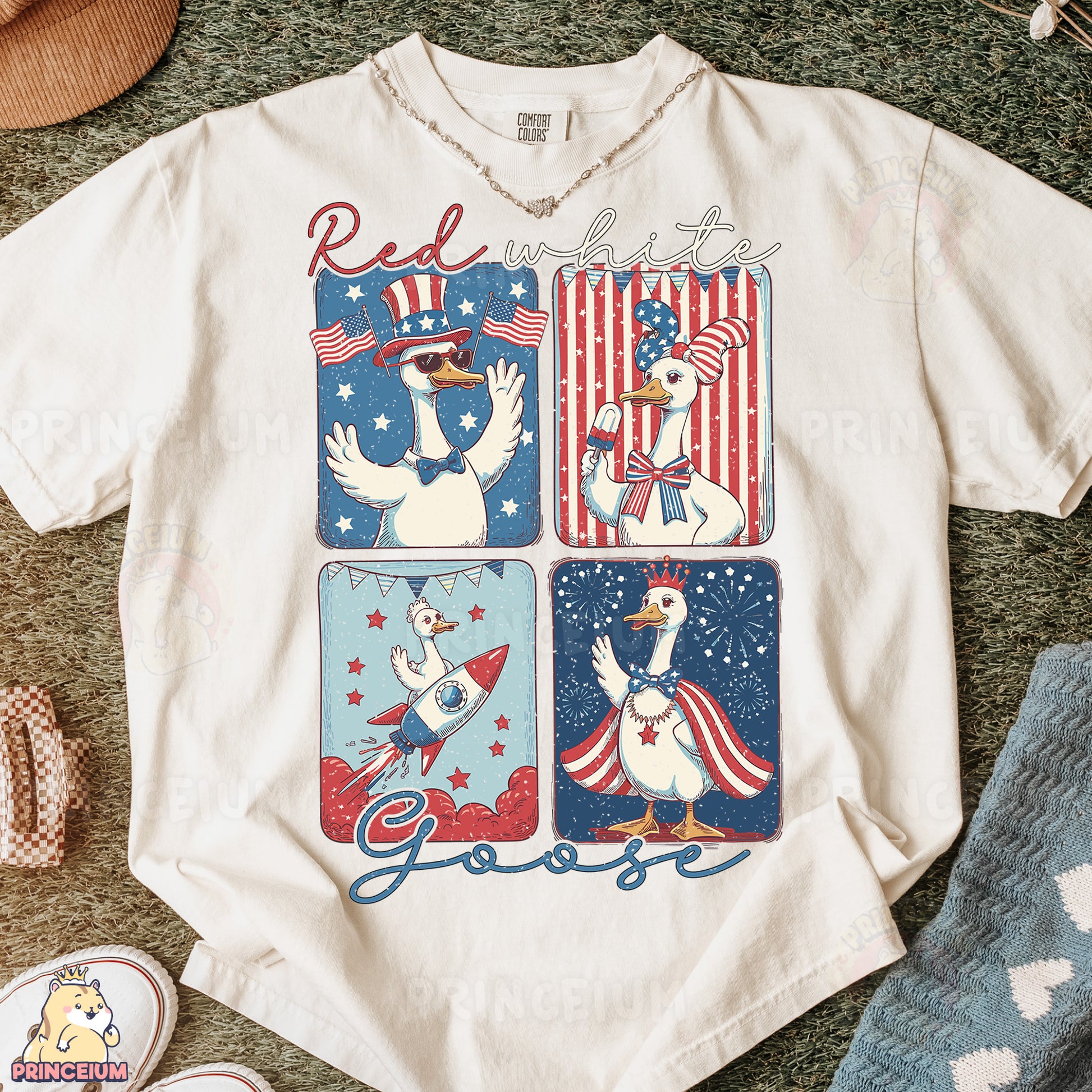 a white t - shirt with a picture of two geese on it