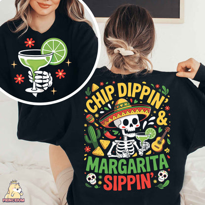 a woman wearing a black shirt that says chip dippin'8 margarita sipin