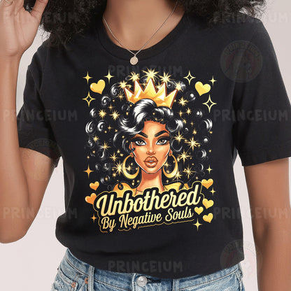 a woman wearing a black shirt with a gold crown on her head