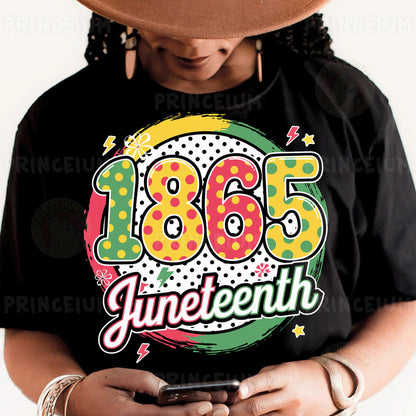 a person wearing a black shirt and a hat holding a cell phone