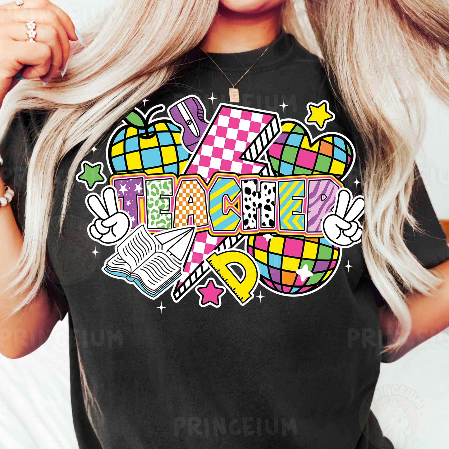 a woman wearing a black t - shirt with colorful designs on it