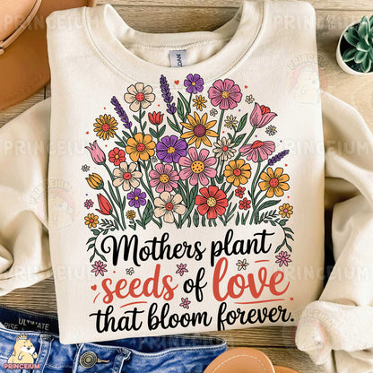 a t - shirt that says mother's plant seeds of love that bloom forever