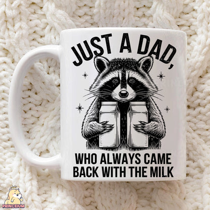 a raccoon is reading a book on a blanket