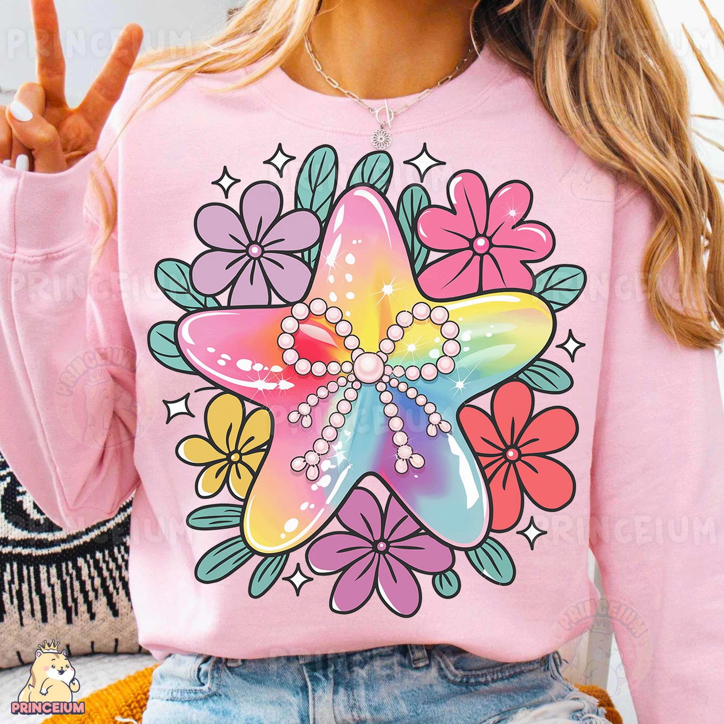 a woman wearing a pink shirt with a starfish on it