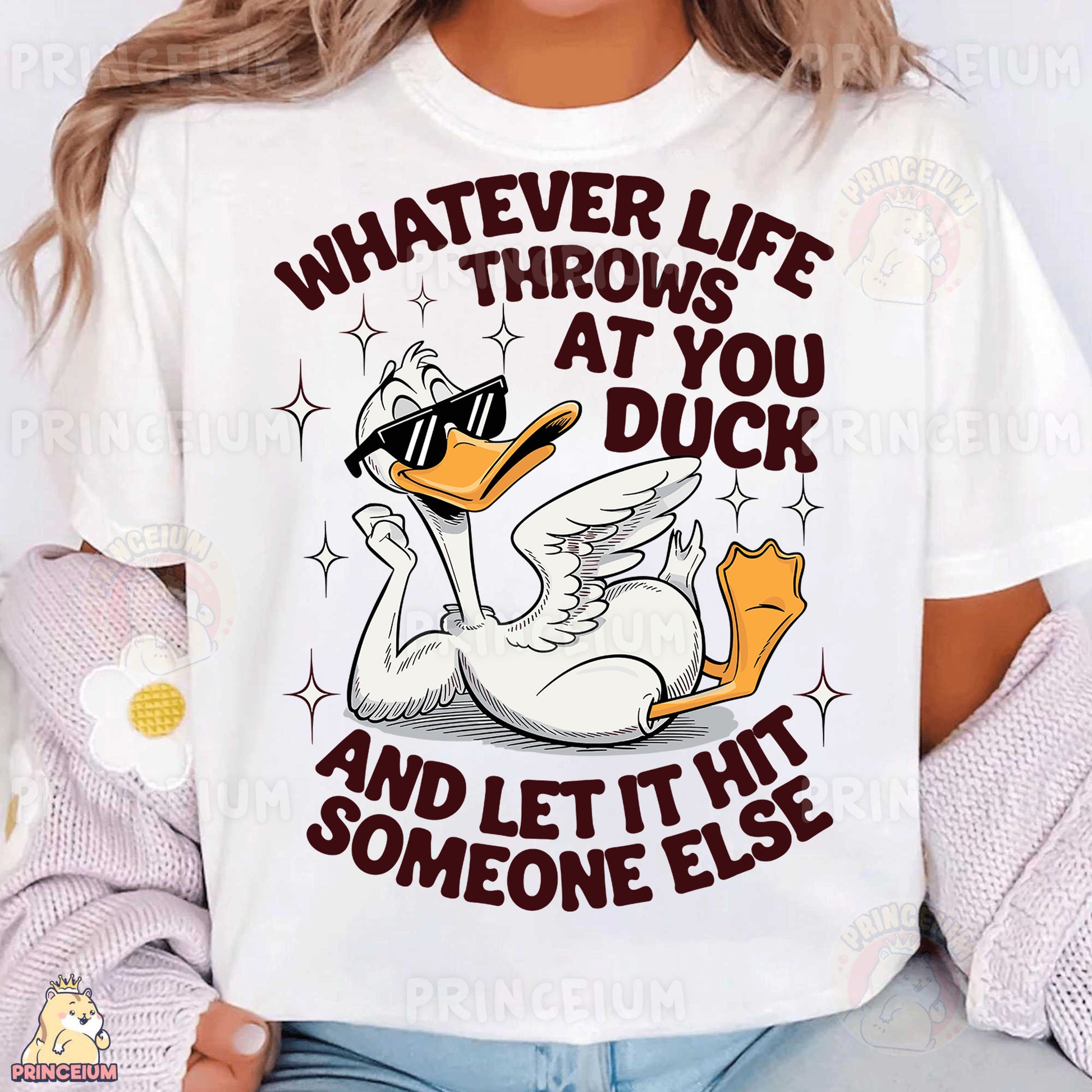 a woman wearing a white shirt with a duck on it