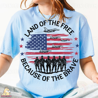 a woman wearing a t - shirt that says land of the free because of the