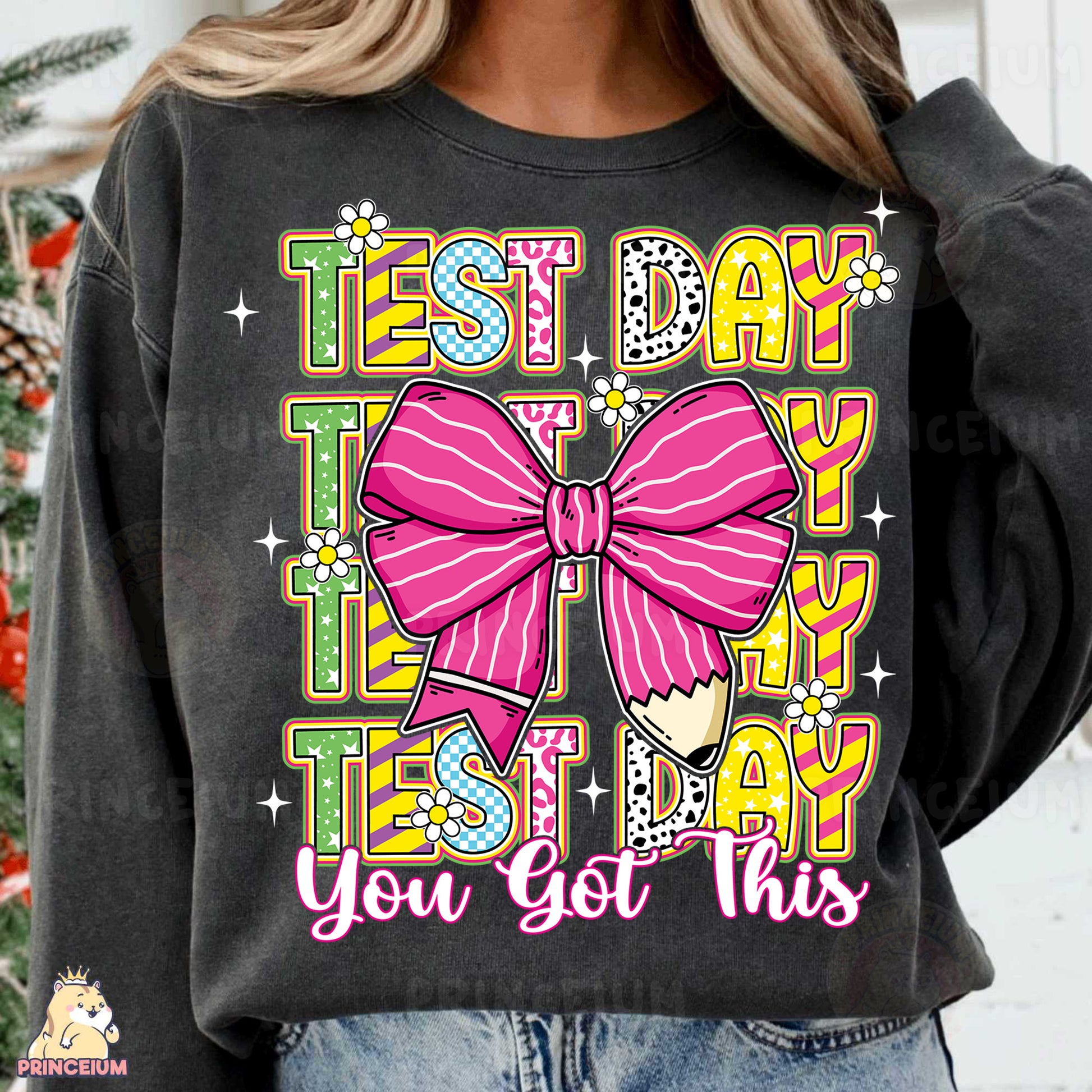 a woman wearing a black shirt with a pink bow on it