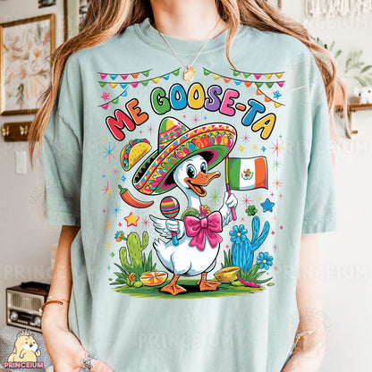 a woman wearing a t - shirt with a duck wearing a sombrero