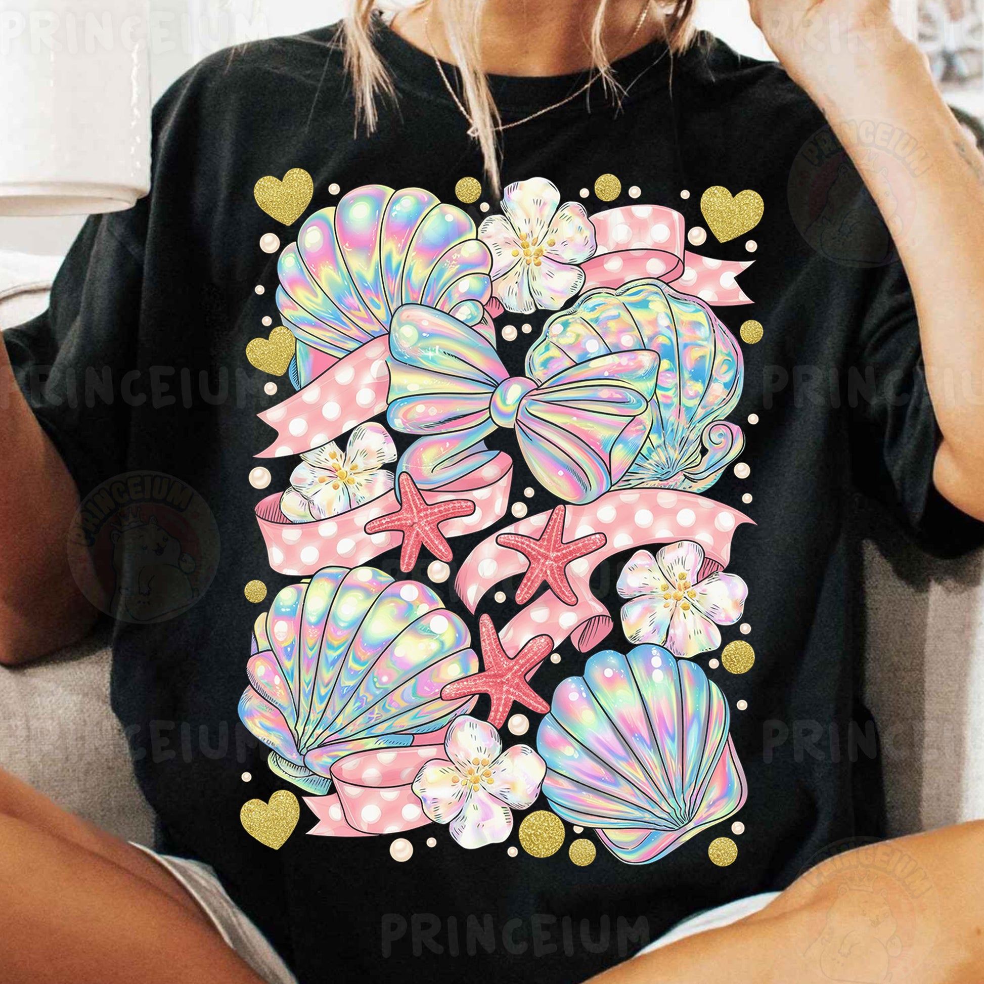 a woman sitting on a couch wearing a black shirt