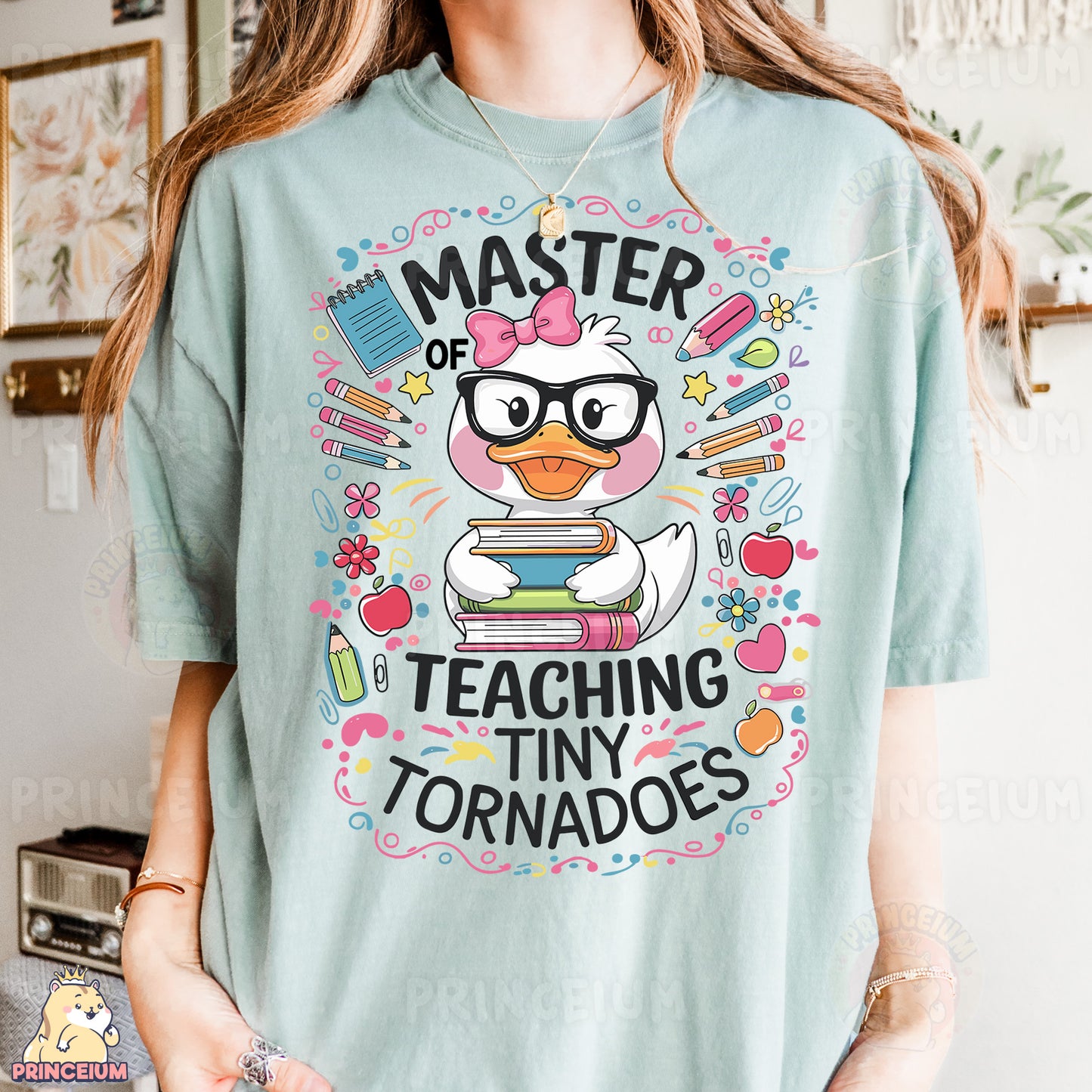 a girl wearing a t - shirt that says, master of teaching tiny tornados