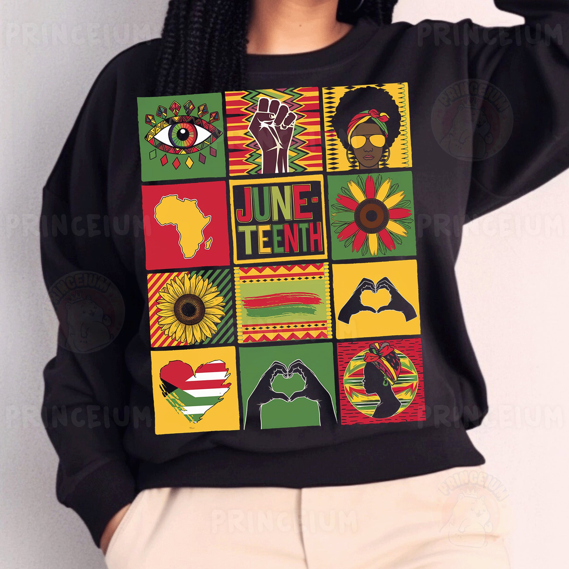 a woman wearing a black sweatshirt with colorful images on it