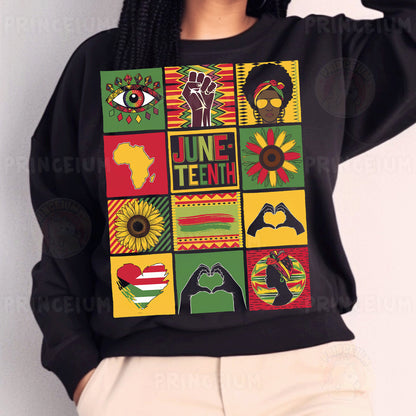 a woman wearing a black sweatshirt with colorful images on it