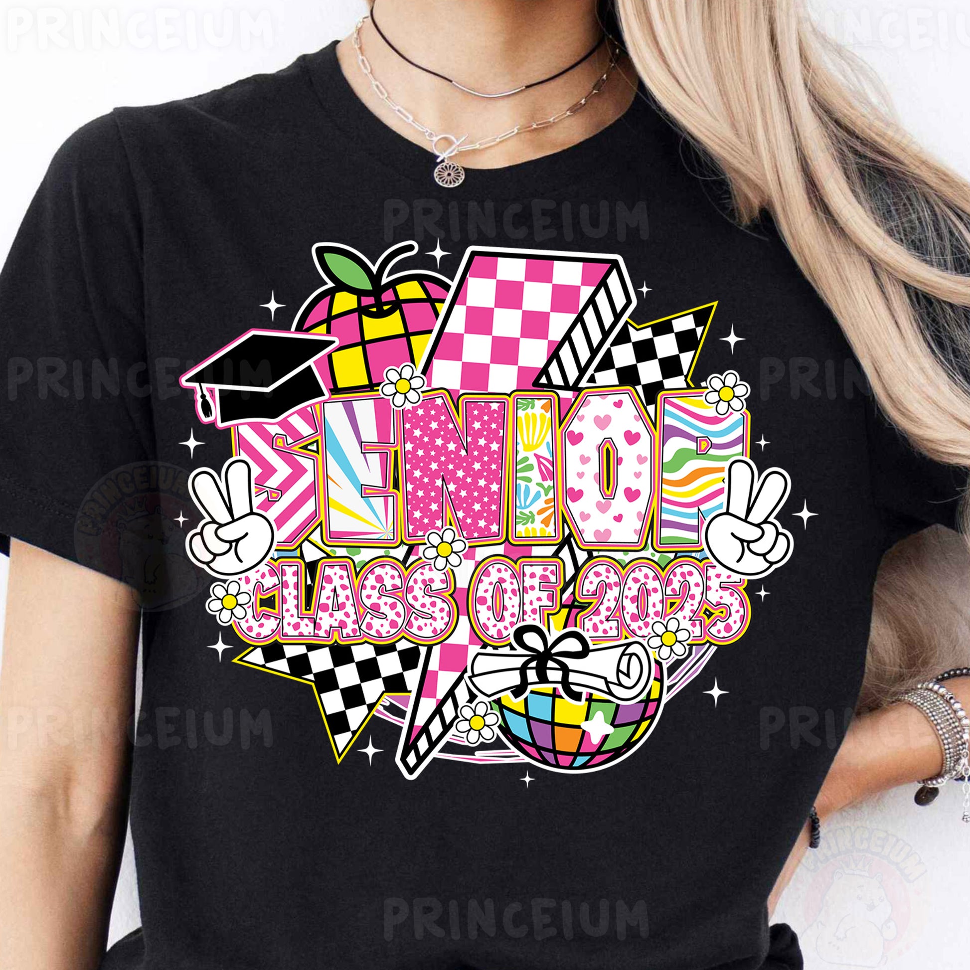 a woman wearing a black shirt with a pink and white checkered design