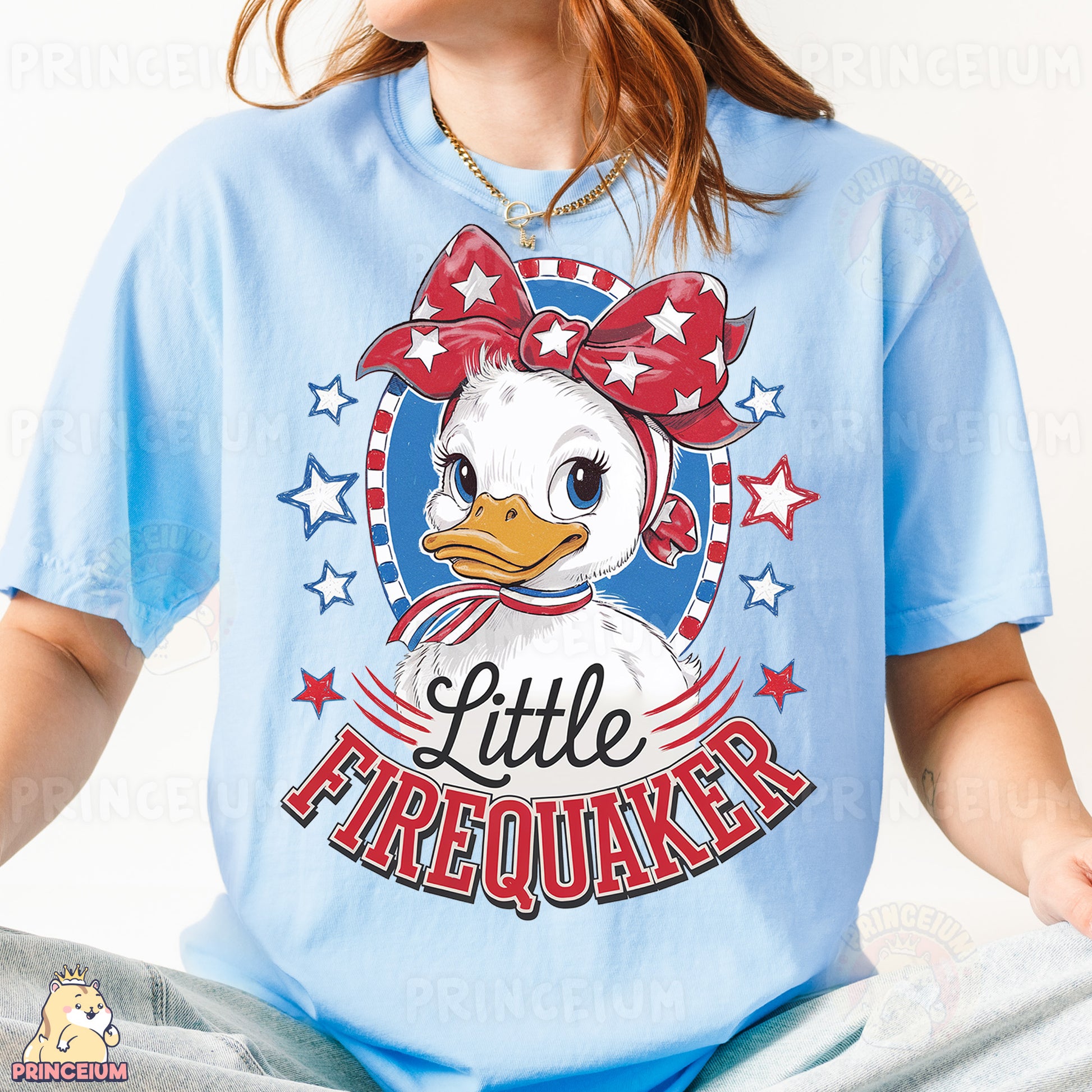 a woman wearing a blue shirt with a duck on it
