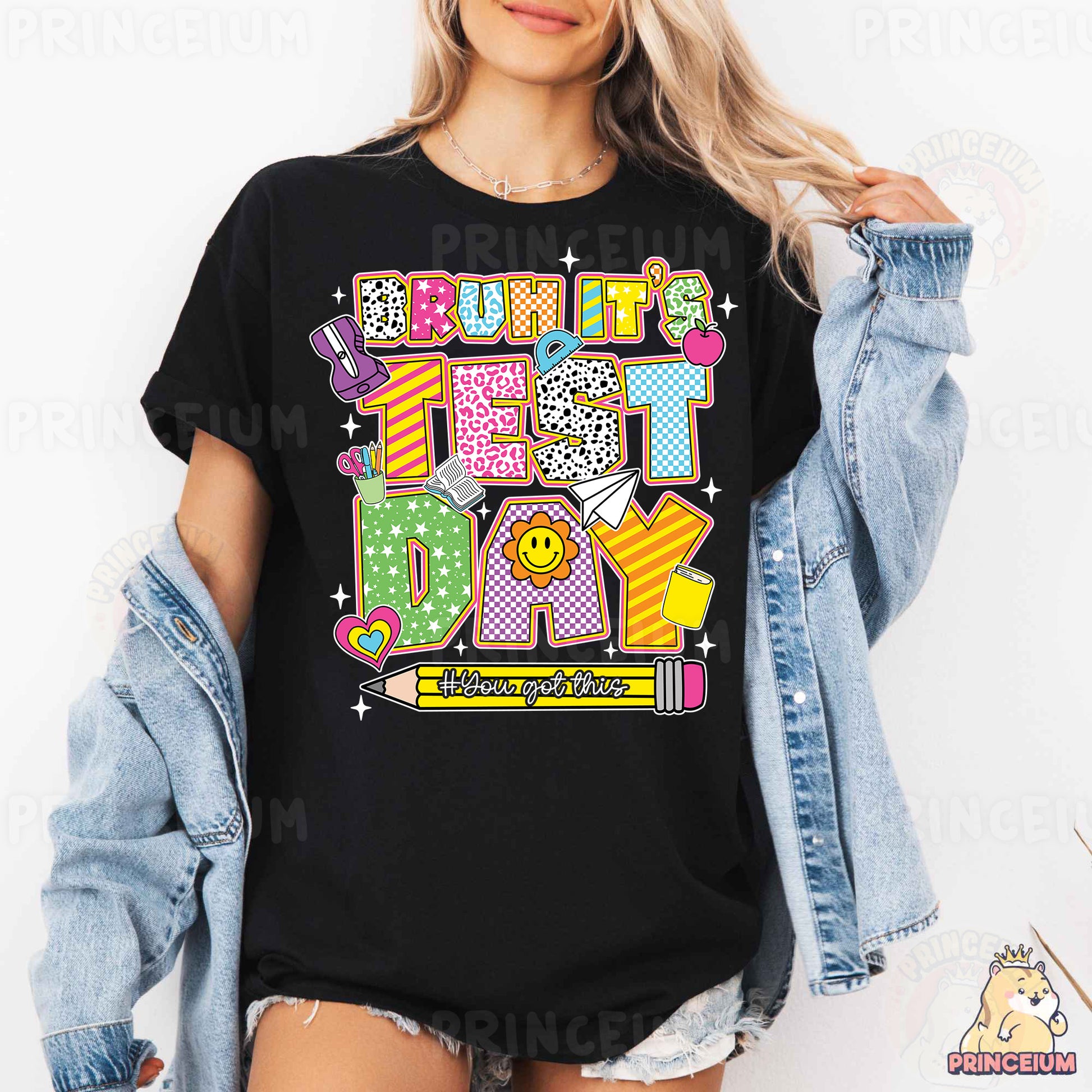 a woman wearing a black tshirt with the words happy birthday on it