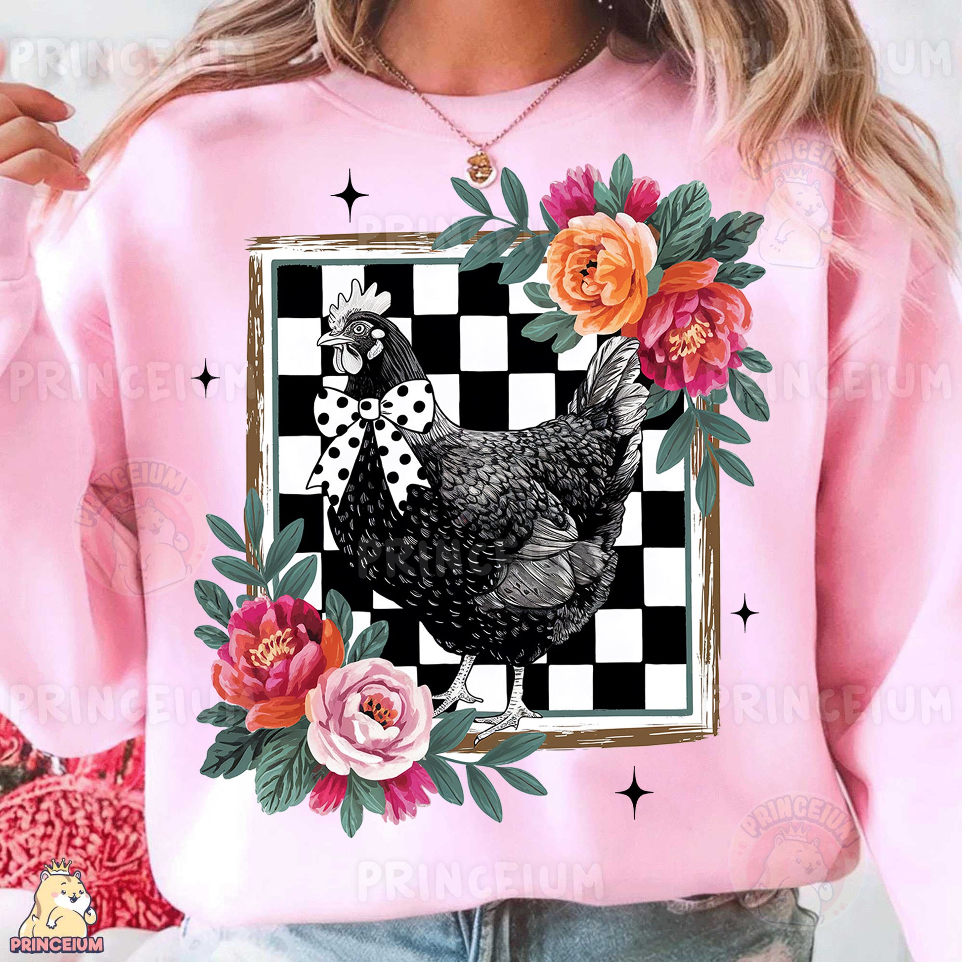 a woman wearing a pink sweater with a chicken on it