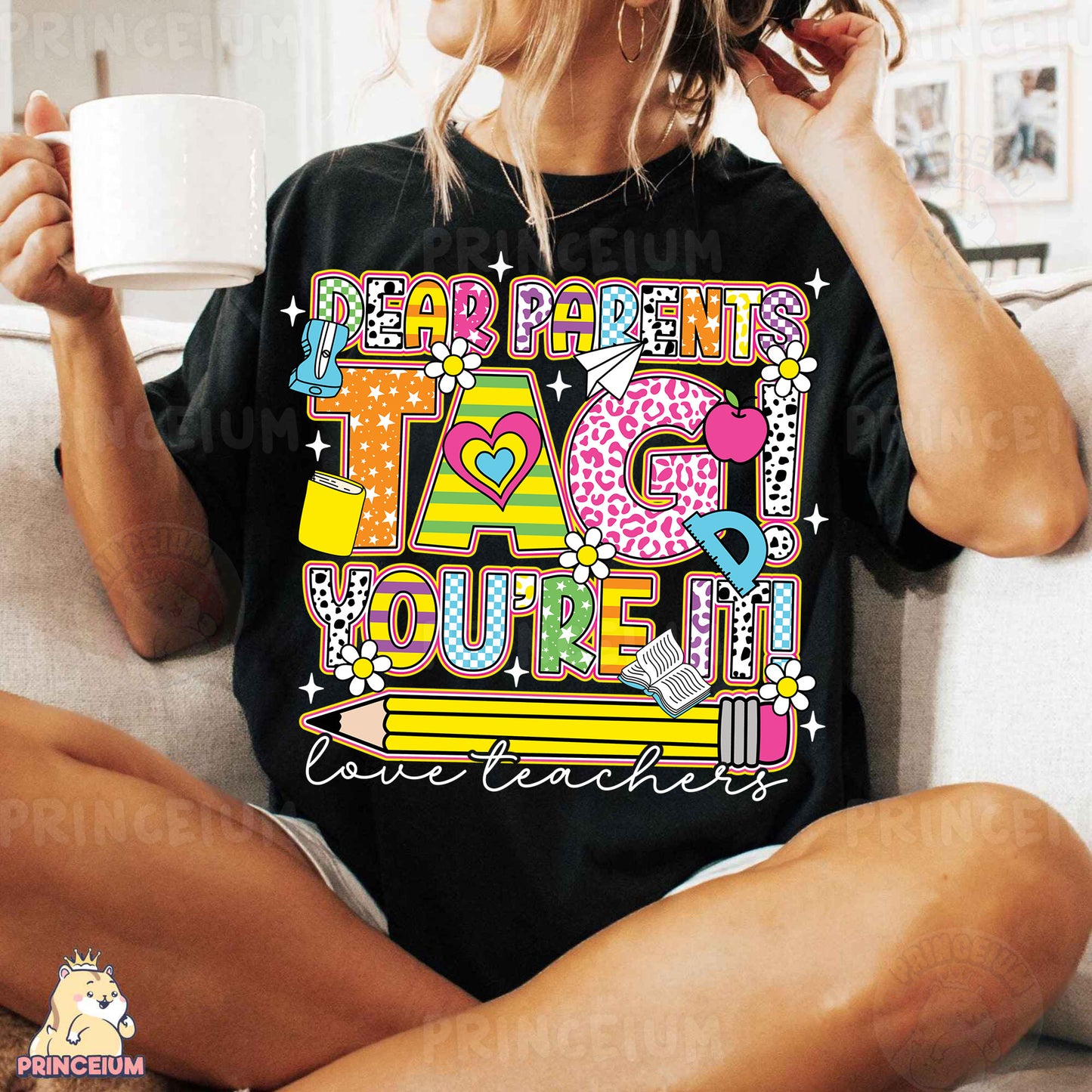 a woman sitting on a couch holding a cup of coffee