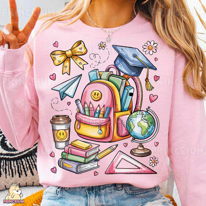 a woman wearing a pink sweatshirt with a backpack and books on it