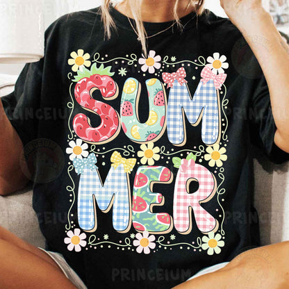 a woman sitting on a couch wearing a black shirt with the word summer printed on