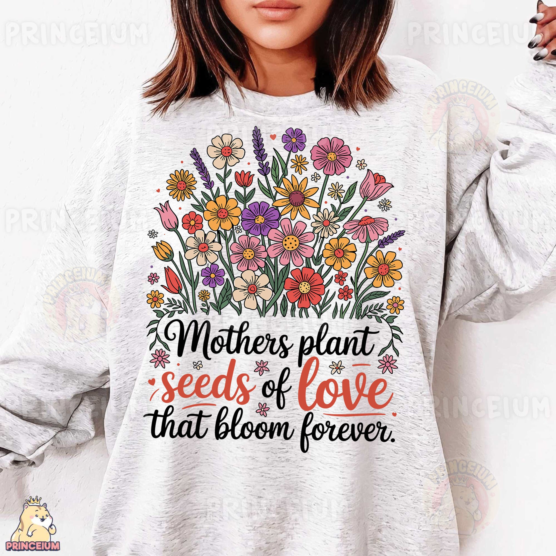a woman wearing a sweatshirt that says mothers plant seeds of love that bloom forever