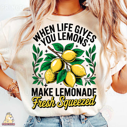 a woman wearing a t - shirt that says when life gives you lemons make