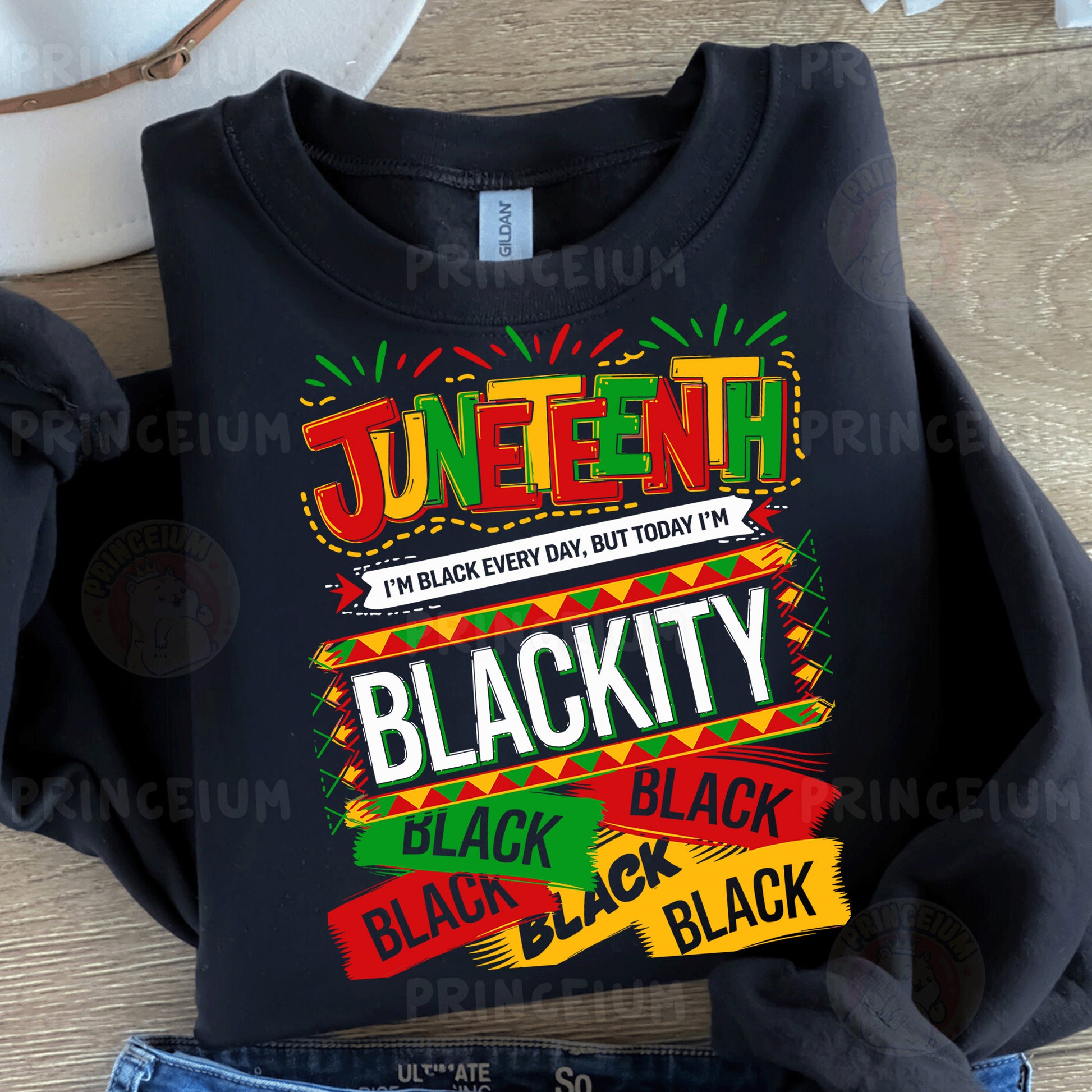 a black t - shirt with the name of a mexican restaurant