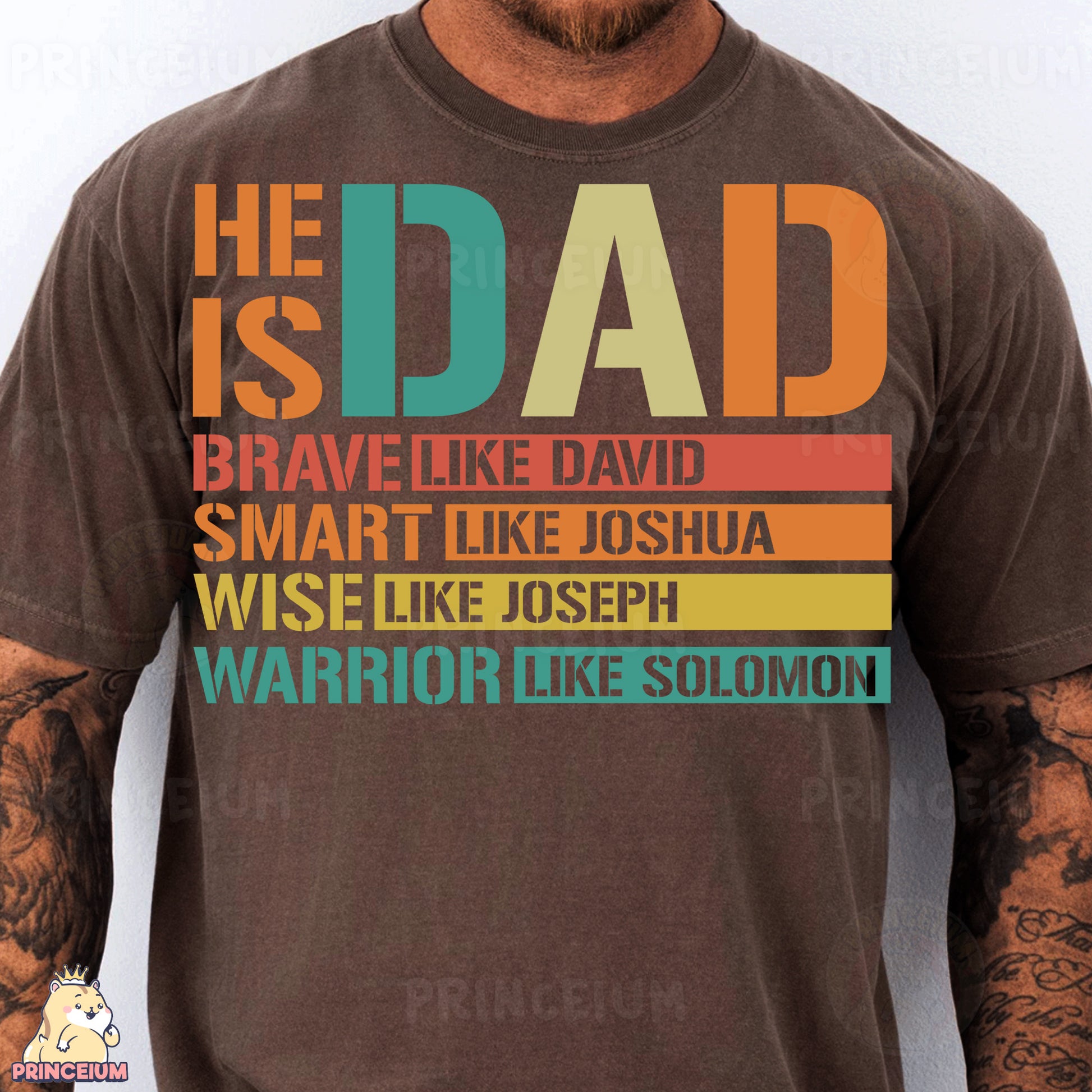 a man wearing a brown t - shirt with the words he is dad on it