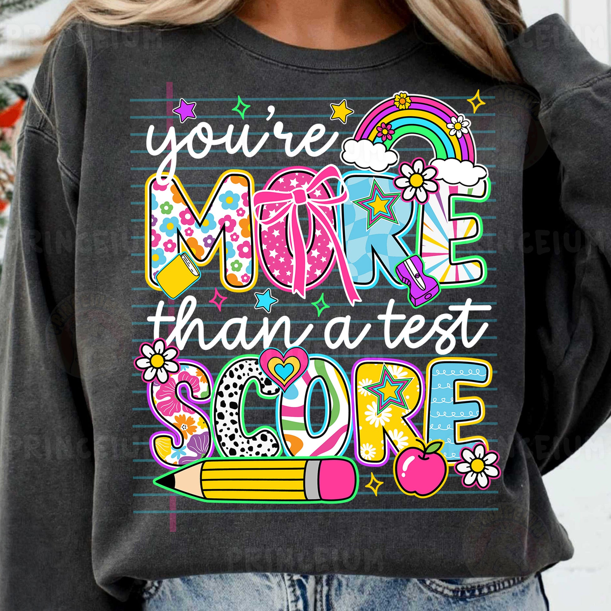 a woman wearing a sweatshirt that says you're more than a test sale