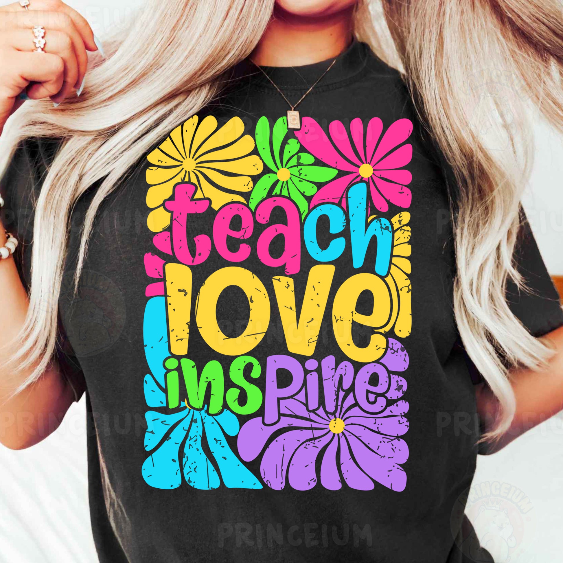 a woman wearing a t - shirt that says teach love inspire