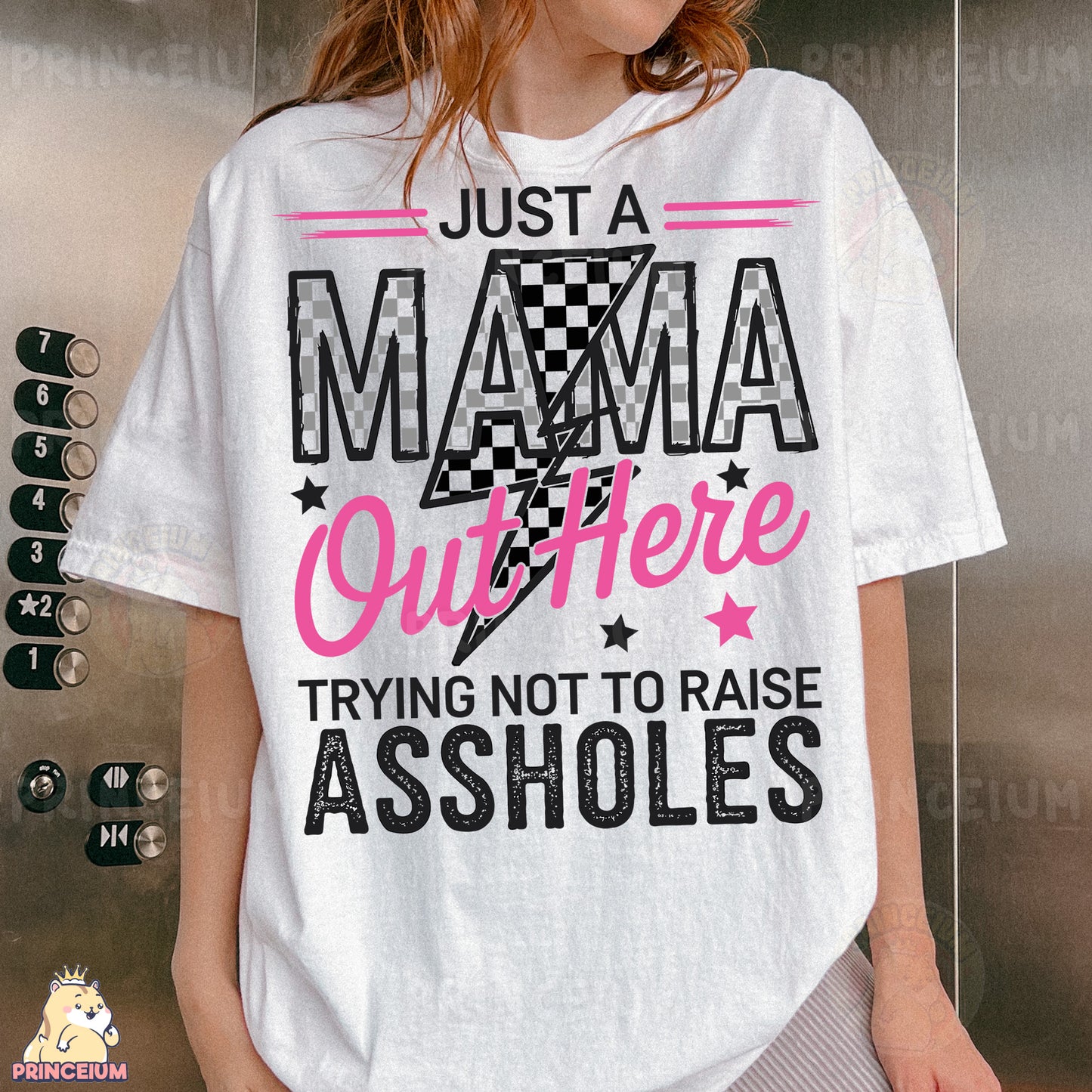 a woman wearing a t - shirt that says just a mama out there trying not