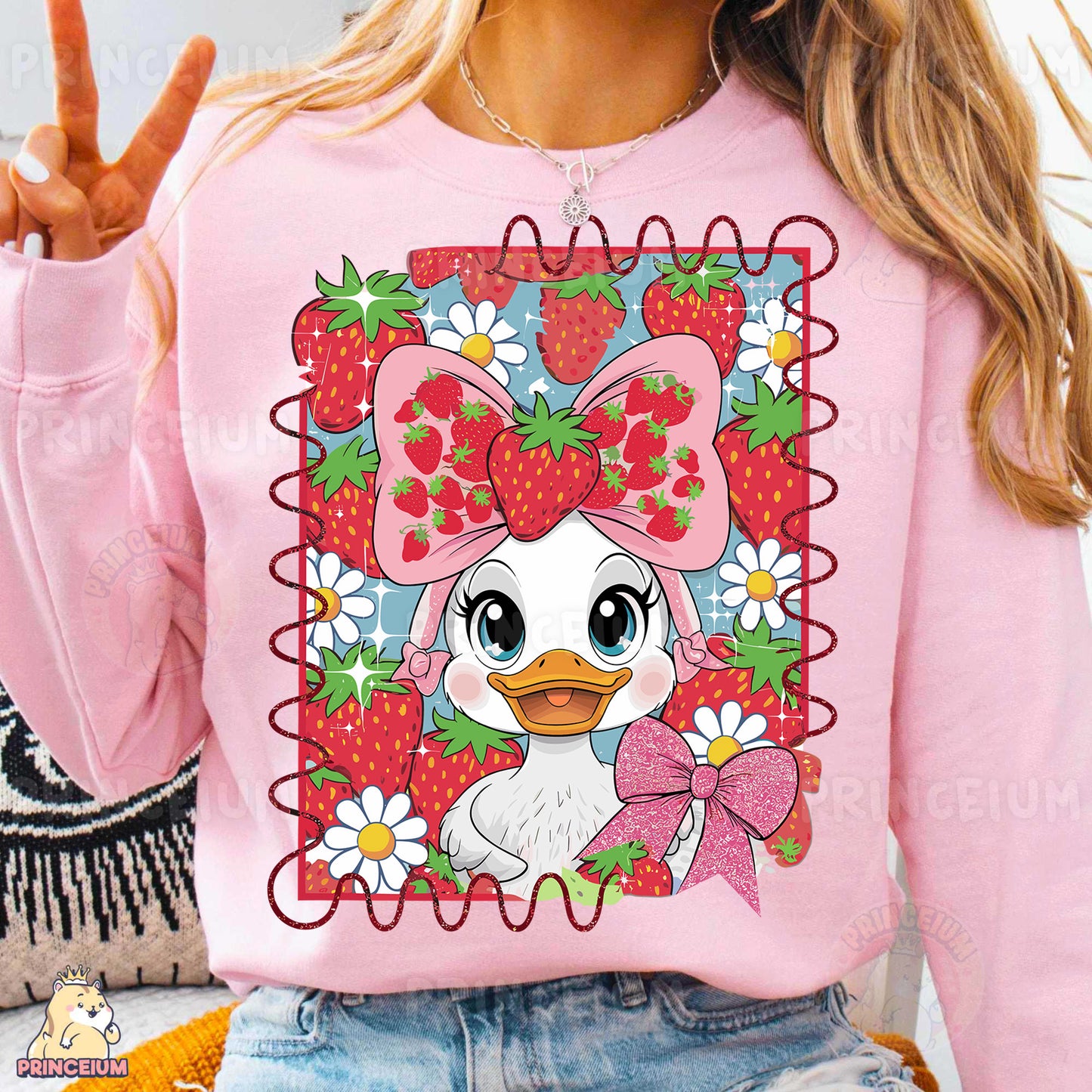 a woman wearing a pink sweater with a cartoon duck on it