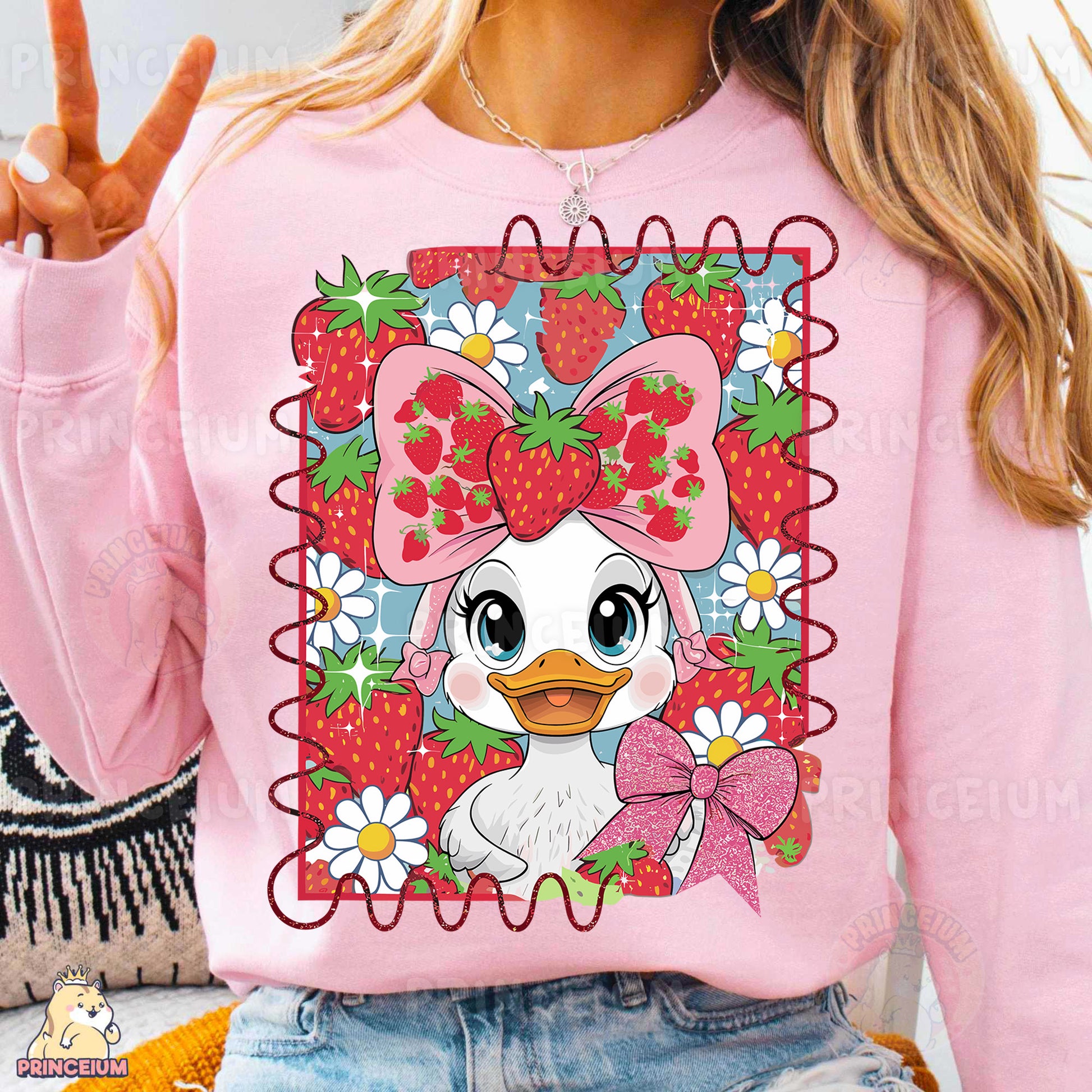 a woman wearing a pink sweater with a cartoon duck on it